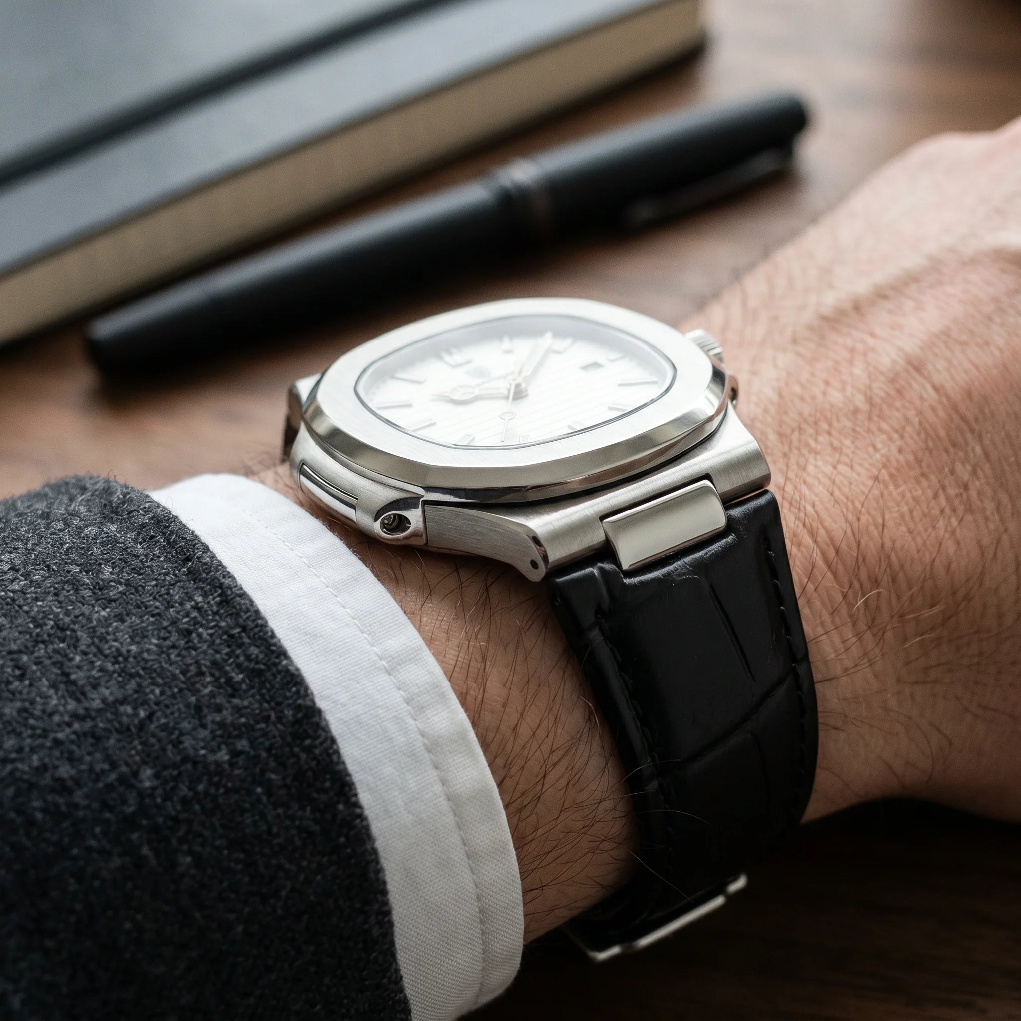 Kron Atlas watch case profile, walnut office desk, side view