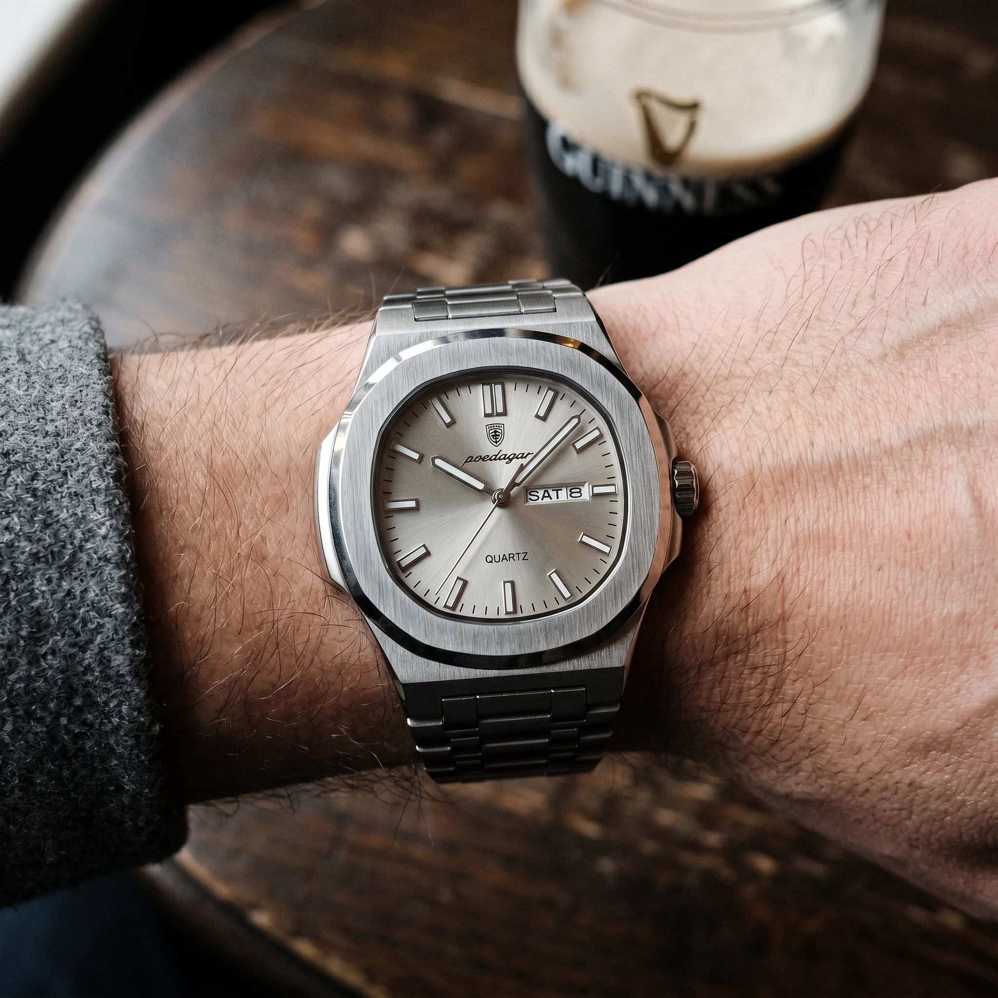 Kron Mayfair watch on wrist, Dublin pub interior, top-down view