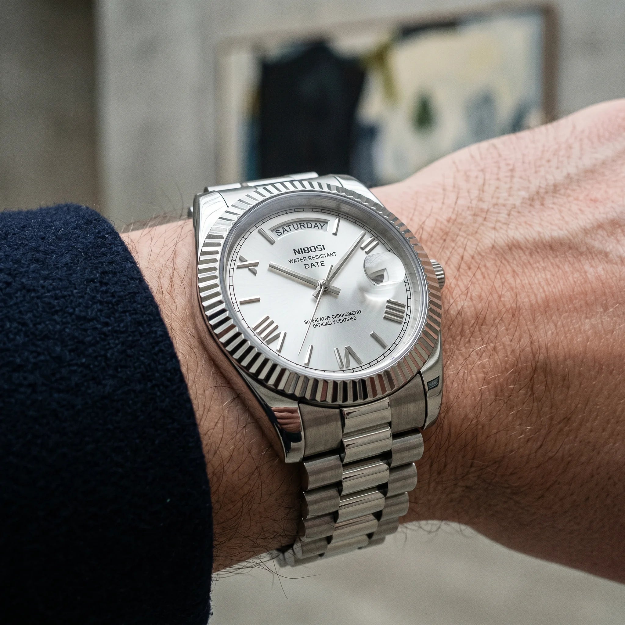Kron Trafalgar watch on wrist, contemporary art gallery, elevated profile